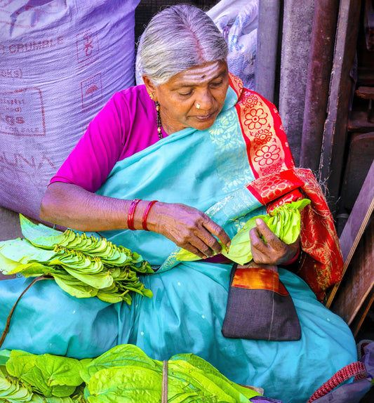 Woman Selling Paan Leaves in India